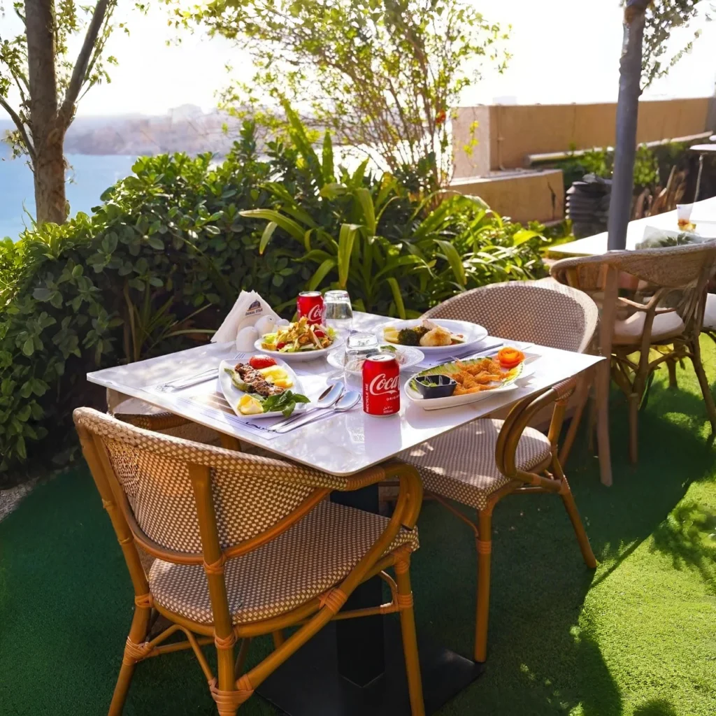 brunch dishes on a table with coke can